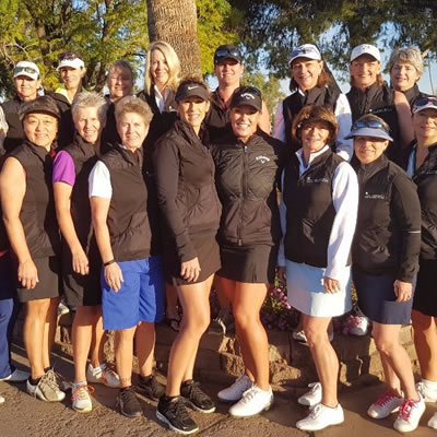 Group shot of golf school students. 