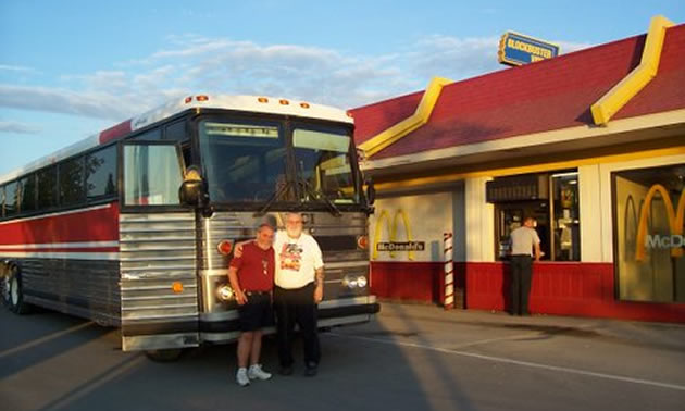 Mike O'Connor (left) and Barry Vestby (right) convinced the tour bus driver to drive through an Alaskan McDonald's drive-thru and place an order.