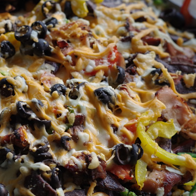 RV oven-broiled nachos are like taking the night off from campfire cooking.
