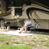 This photo was taken at Pembina River near Flatbush, Alberta. We drive our ATV off road to where the two rivers join for some excellent fishing. We return in the evening to our 2011 Entegra Aspire motorhome to fry up some of our day's catch.