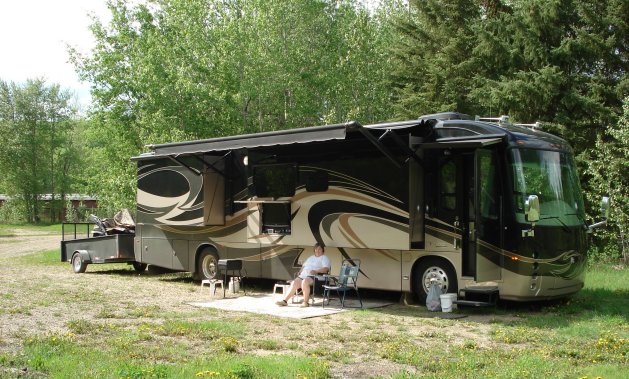 This photo was taken at Pembina River near Flatbush, Alberta. We drive our ATV off road to where the two rivers join for some excellent fishing. We return in the evening to our 2011 Entegra Aspire motorhome to fry up some of our day's catch.