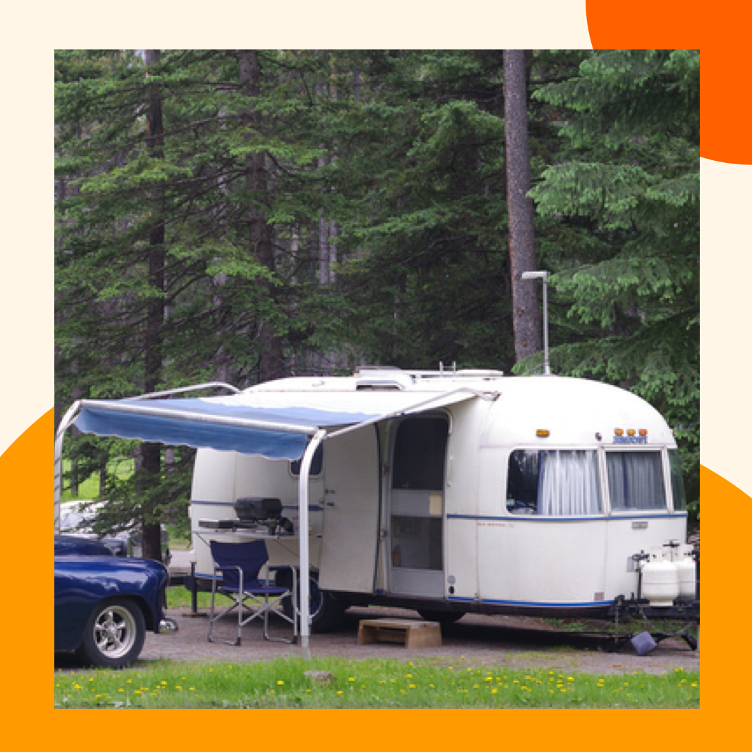 RVs lined up, all vintage units