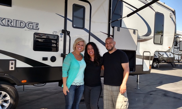 Johnnie Walker RV Salesperson Shawna Fitch  with customers Cesareo and Janette Razo.