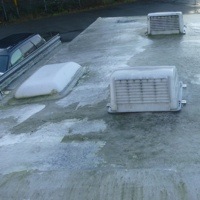 Roof on original RV waiting for re-roofing