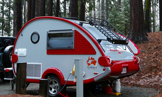 Red and white retro RV rental at The Inn Campground in Nevada City. 