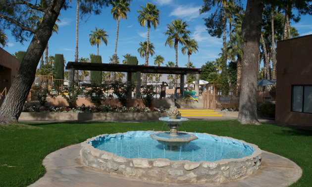 Fountain at main gate of resort. 