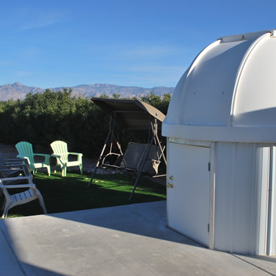 Small observatory surrounded with chairs and loungers. 