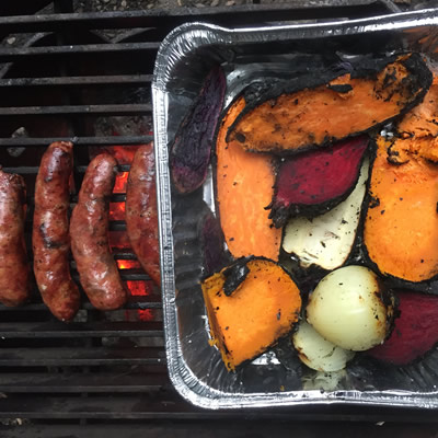 Fire-roasted veg with a side of homemade sausage.