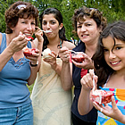 girls eating ice cream at the strawberry festival in Saanich