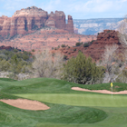 Desert rock formation and golf green