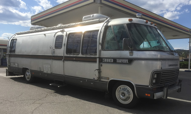 A classic 1982 Airstream 310 turbo diesel motorhome, spotted fueling up at a local gas station. 