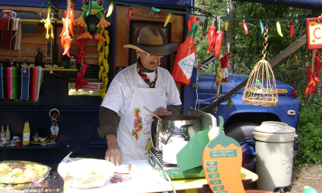 Bob Braisher prepares tasty chili at the 2009 Spilli Chilli cookoff in Spillimacheen.