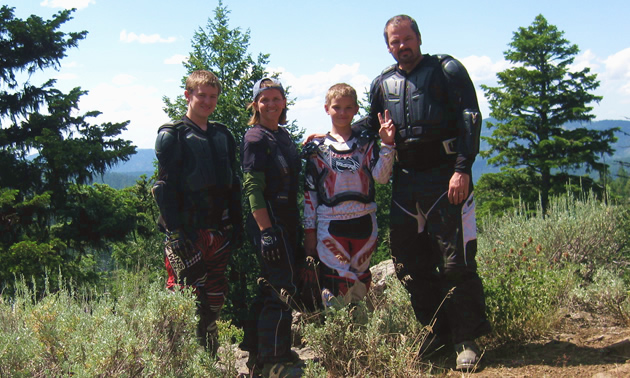 The four Tanners enjoying a day of dirt biking on their latest RV trip.