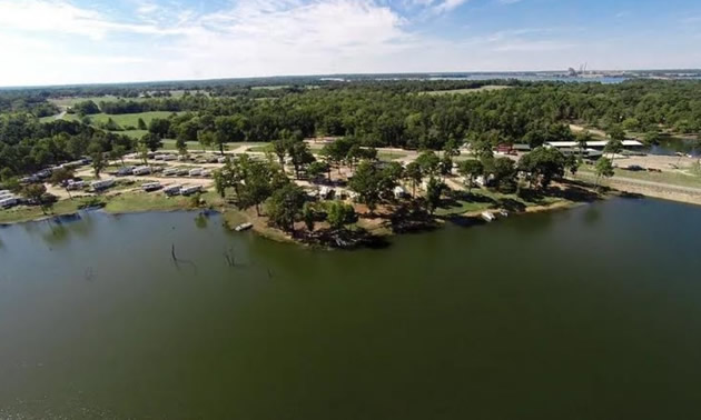 Aerial view of a Texas campground along a river. 