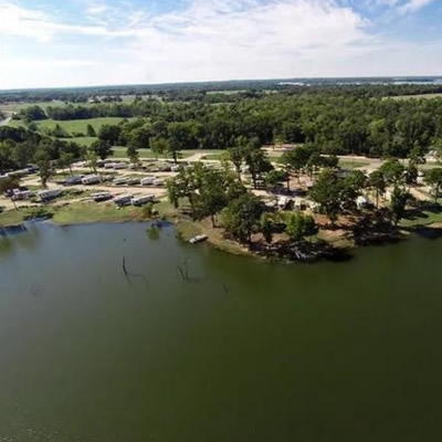 Aerial view of a Texas campground along a river. 
