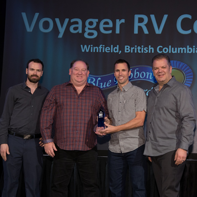 Voyager RV managers receive industry recognition: (L to R)  Logan Walker, Ward Fraser, Jason Friesen (vice-president) and Mike Roberts.