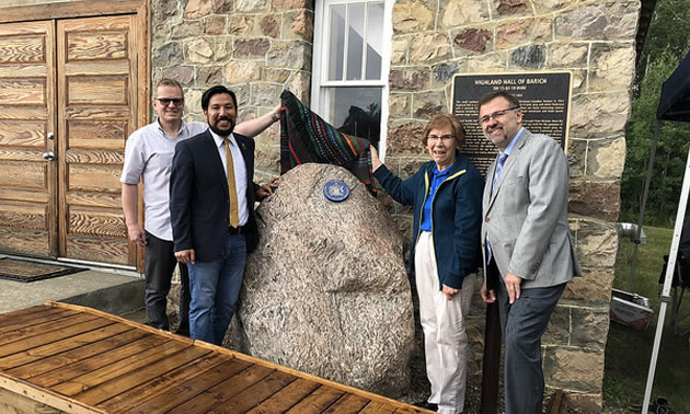 Minister Miranda, MLA Piquette and members of the Highland Community Hall of Barich Society and Smoky Lake County officials celebrate designation of the Ukrainian Farmers’ National Home of Taras Shevchenko (Highland Hall) as a Provincial Historic Resource.