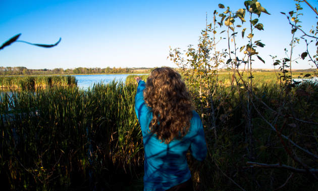 A lady looking for birds