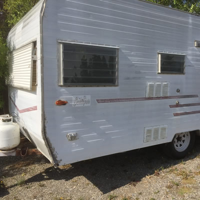 A vintage Scamper travel trailer. 