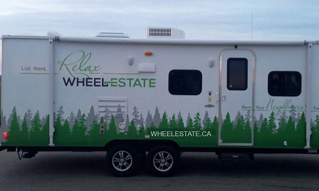 Trailer with Wheel Estate graphics/info on it. 