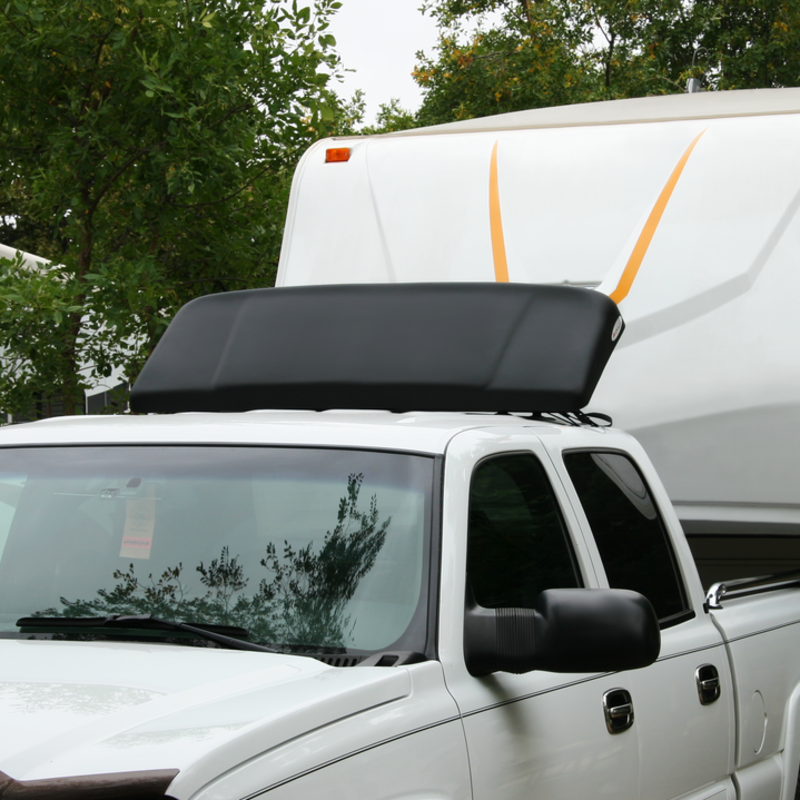 wind deflector attached to an RV