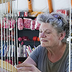 lady at a loom making crafts at Madeira park, BC
