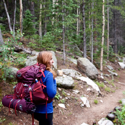 A backpacker hikes in Golden Gate Canyon State Park in Colorado.