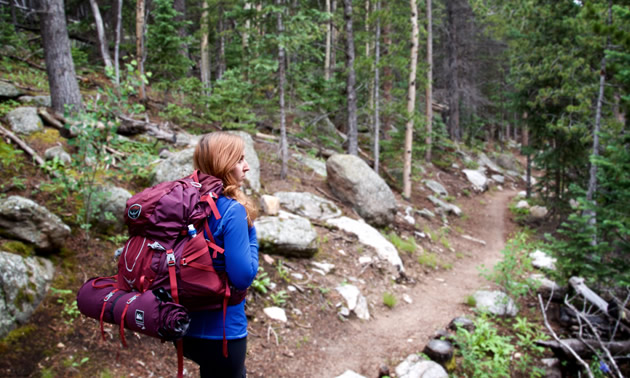 A backpacker hikes in Golden Gate Canyon State Park in Colorado.