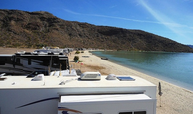 A row of RVs travelling with Bajo Amigos.