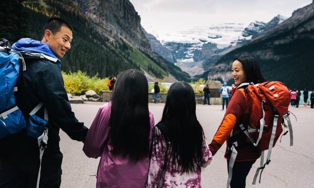 A family in front of the mountains in Banff