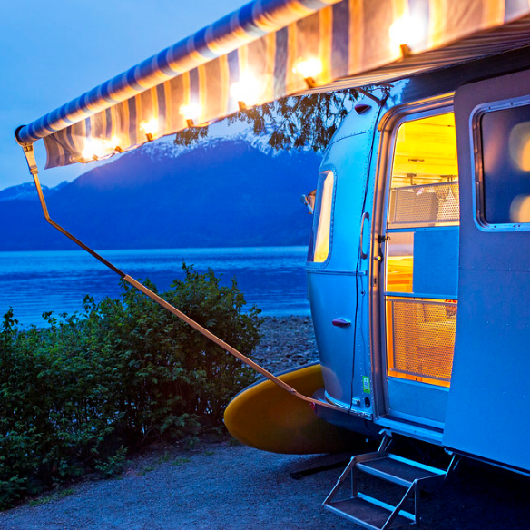 RV by the water at night