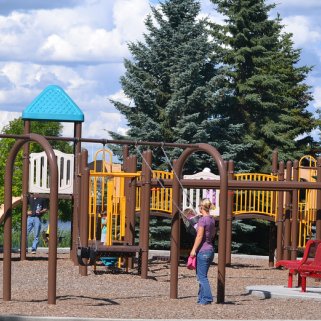 Children have fun at the playground in Fred Johns Park, Leduc, AB. Photo by 