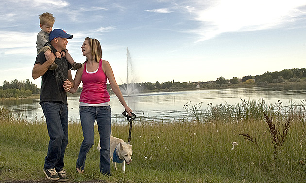 family walking through a park