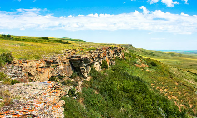 A cliff that served as a buffalo jump for First Nations is commemorated at Head-Smashed-In Buffalo Jump near Fort Macleod, Alberta.