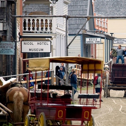 horse drawn buggy with tourists in Barkerville