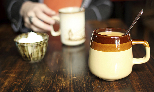 people enjoying coffee as they do in Swift Current, SK