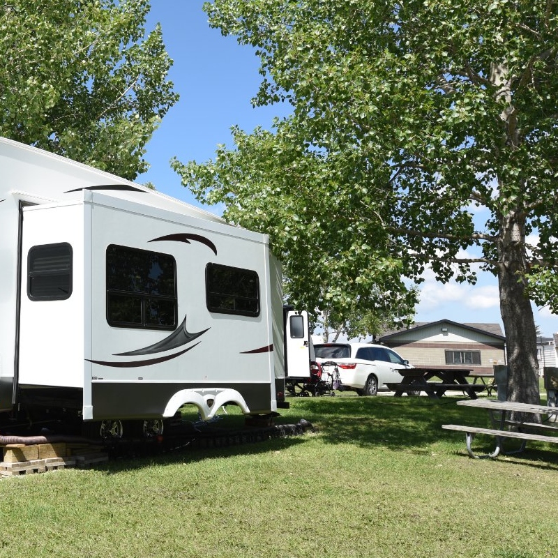 Calaway Park Campground with RVs parked under shady trees
