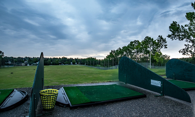 A photo of the Confederation Park Golf Course in Calgary, showing the driving range.