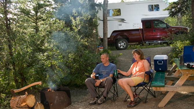 Couple enjoying camping. 