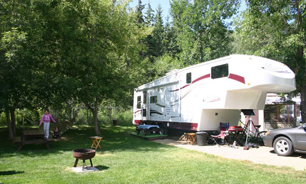 Picture of campground with trailer. 