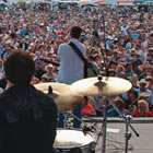 people playing music on stage