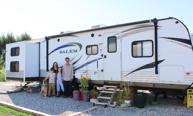The Perry family showing their RV unit