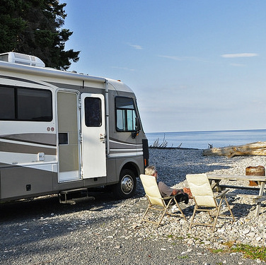 The Elliott's rig parked on the beach at St. Ann's Bay Campark, Cape Breton, NS.