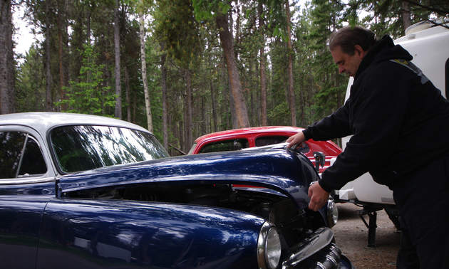 Bob Hielmeier closing the hood os his '52 Chevy