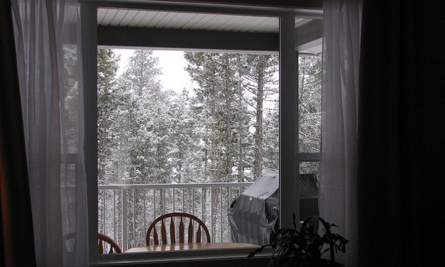 Photo of a winter scene from inside the home. 