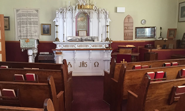 The small chapel in the Heritage Museum has a white altar.