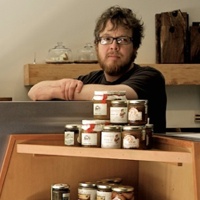 Steve Jones standing behind his Cheese bar.