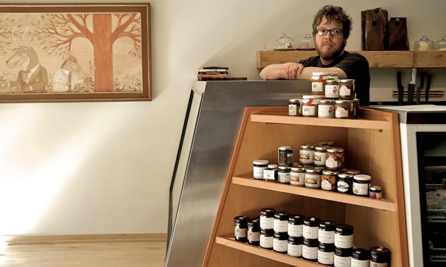 Steve Jones standing behind his Cheese bar.