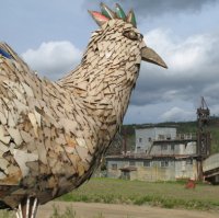 Chicken's mascot 'Mr Eggee' overlooking the Pedro dredge.