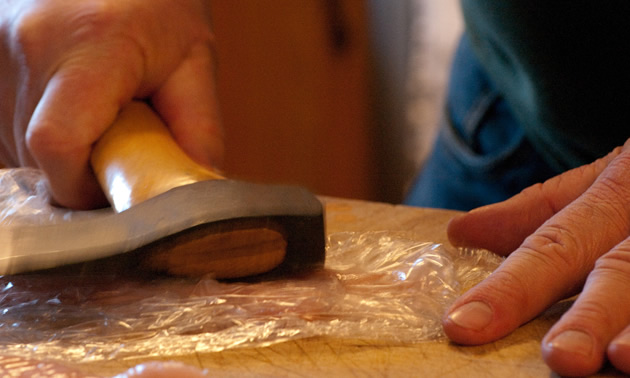 A small axe is a near-perfect tool to make chicken cutlets.